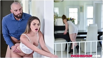 Athena Faris performs a sensual footjob on her stepdad beneath the table